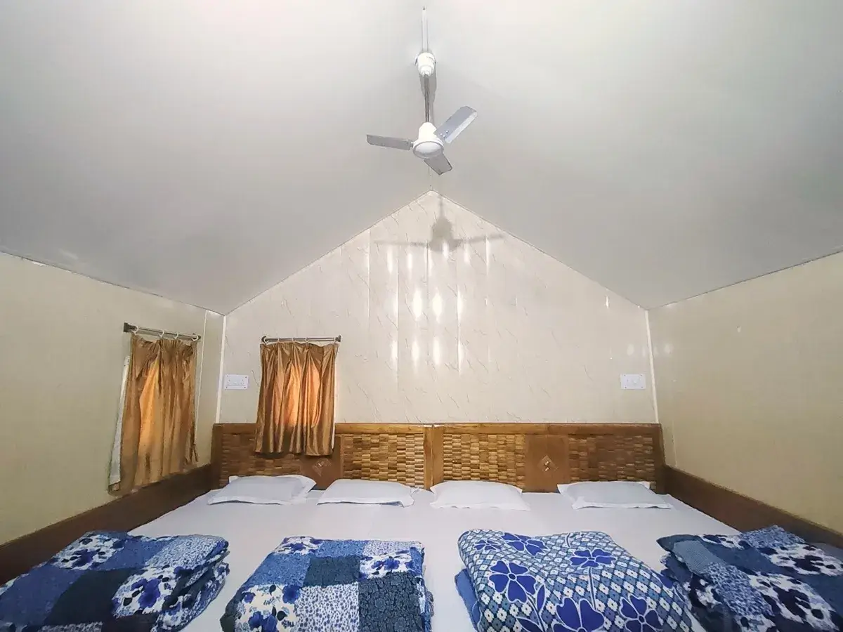 Cozy cabin interior at Camp Roxx — camping near Delhi